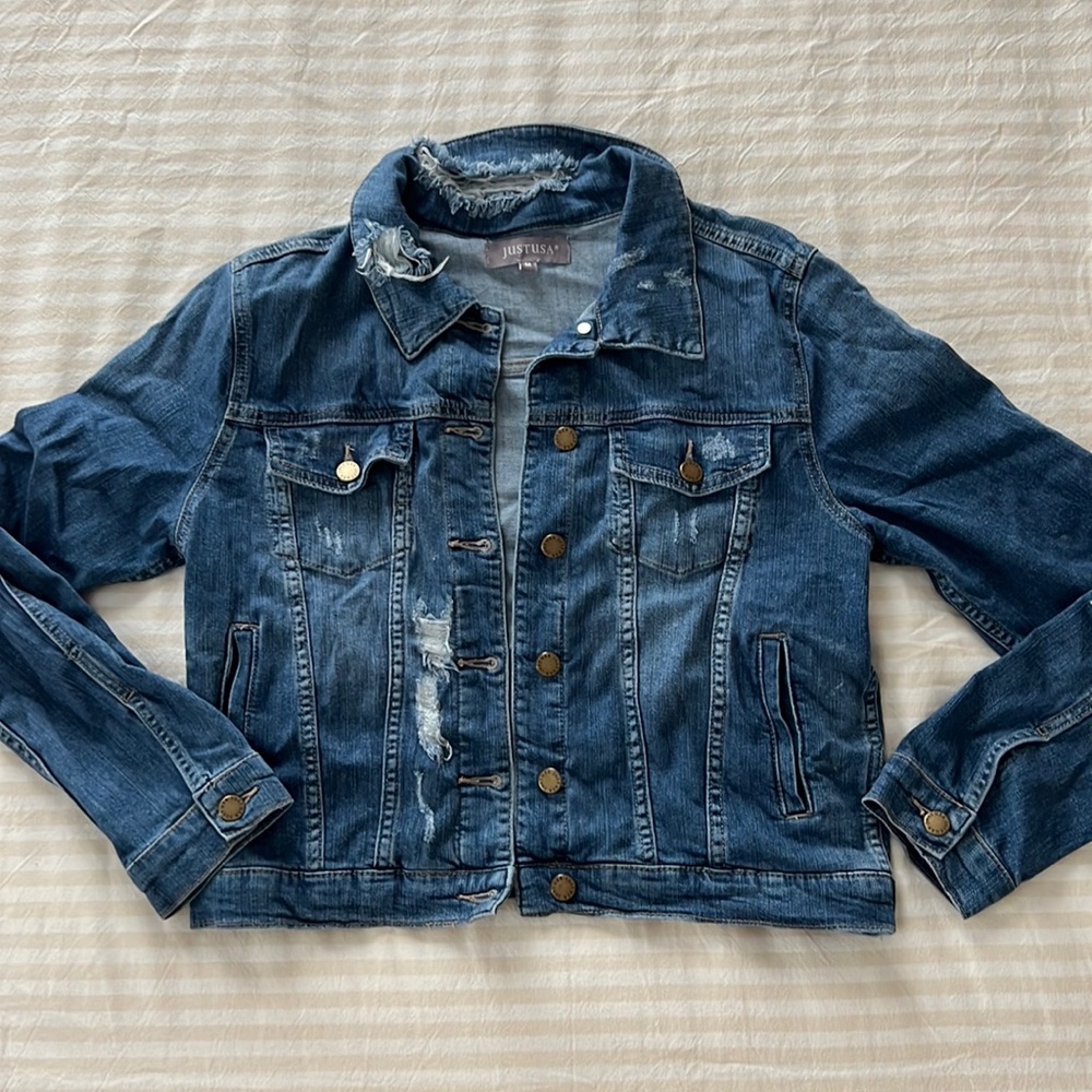 Distressed denim jacket
